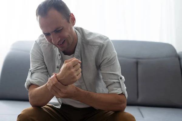 Mans Arm Touches Painful Wrist Caused Work — Stok fotoğraf