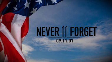911 We will Never Forget text message with USA flag on wooden background. High quality photo