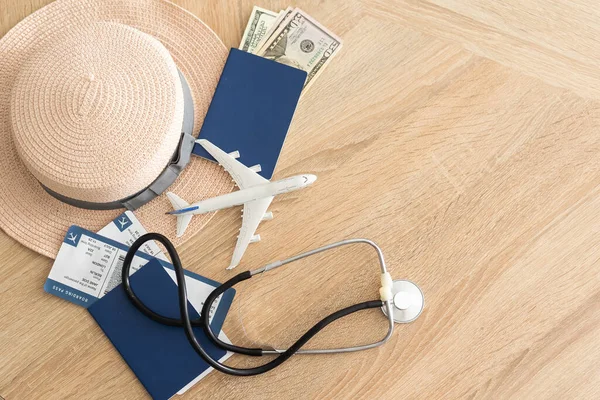 Medical Tourism Concept Stethoscope Passport Tickets Toy Plane — 图库照片