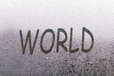 Inscription word on sweaty glass.