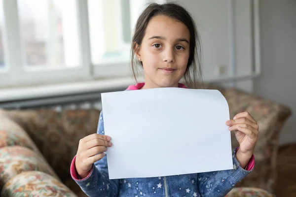 Conceptual Image Sad Dejected Little Girl Holds Blank Sheet Paper — Stock Fotó