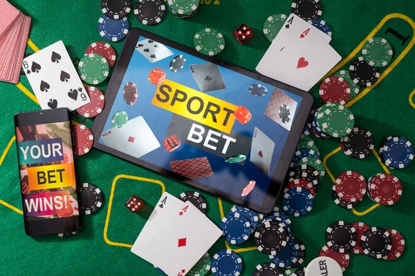 Gambling online casino Internet betting concept green screen. smartphone with poker chips, dice. Jackpot, casino chips