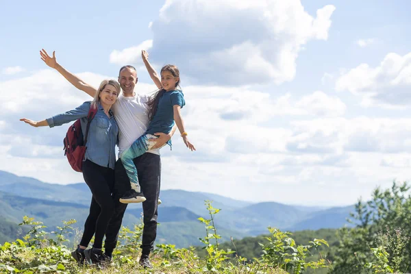 Happy family enjoying life together at meadow outdoor. Royalty-Free Stock  Image - Storyblocks