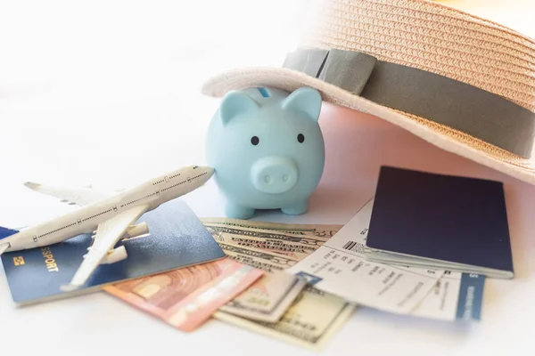 Travel or vacation money saving concept, piggy bank.