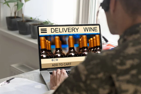 hands holding digital tablet with app delivery food wine screen