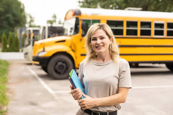 Happy Shcool Teacher Holding Books — 스톡 사진