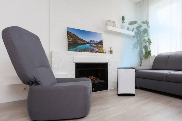 White Air purifier in living room for fresh air and healthy life. Copy space.