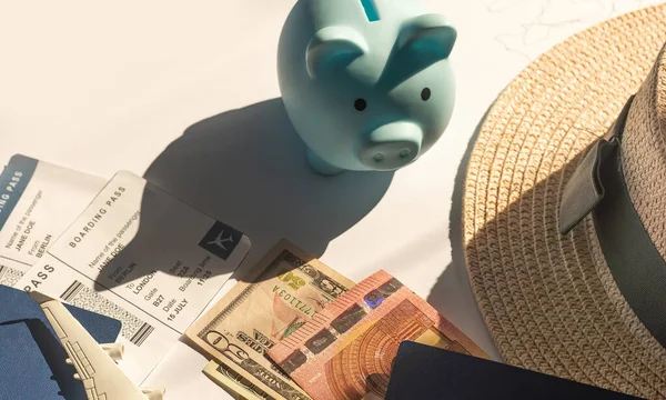 Travel or vacation money saving concept, piggy bank.