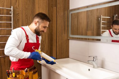 plumber service. wash basin installation.
