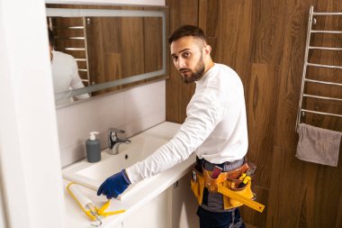 plumber service. wash basin installation.