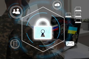 Technology concept with cyber security internet and networking, laptop, screen padlock icon on digital display. flag of Ukraine