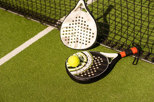 padel tennis racket sport court and balls