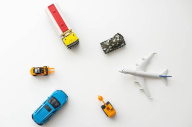 Plastic car, different types of toy transport.