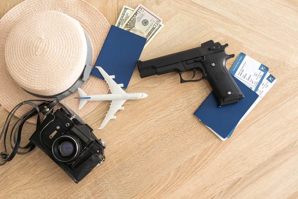 Travel Vacation Concept Passport Money Gun Wood Top Table — 图库照片