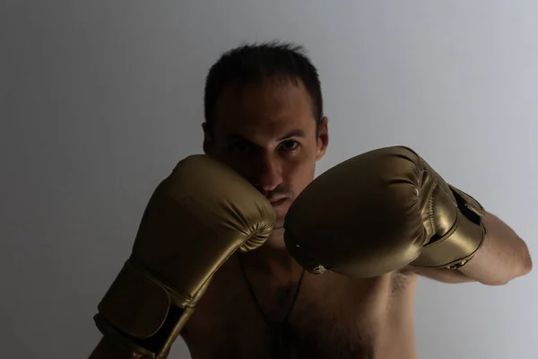 Closeup Shot Young Naked Boxer Wearing Protecting Gloves Throwing Puches — Stock Photo, Image