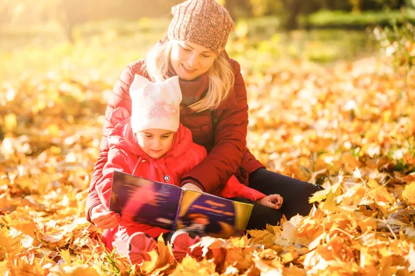 Cute Little Girl Reading Book Outdoors Autumn — Stock Photo, Image