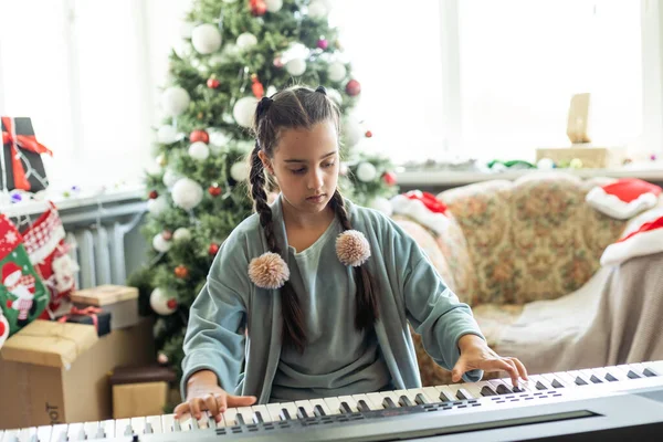 Christmas Child Little Girl Playing Piano Home — Stock Photo, Image
