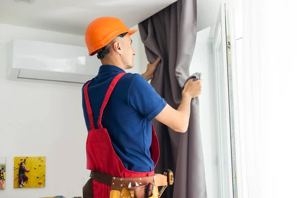 Man Doing House Works Attach Railing Hang Curtains Home — Photo