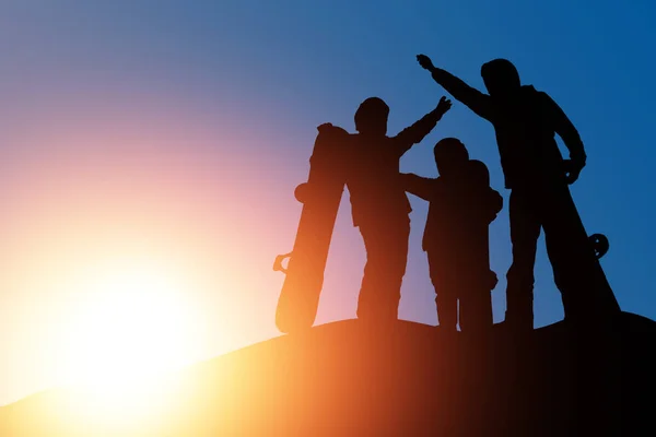 Sunset Silhouettes Family Snowboard Vacation — Stock Photo, Image