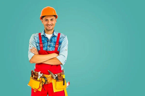 Trabalhador Construção Masculina Sobre Fundo Turquesa — Fotografia de Stock