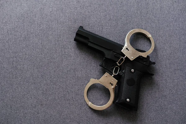 Black Gun Metal Handcuffs Lie Black Background Private Detective Work — стоковое фото