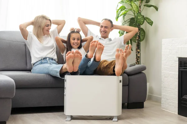 Electric Heater Home Young Family Warms Heating Radiator — Stock fotografie