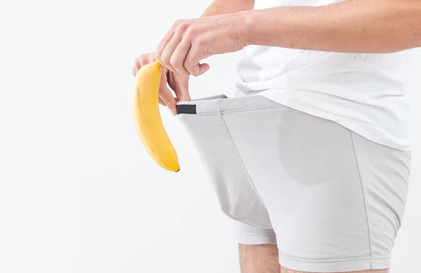 Man Holding Banana Fruit Gun His Trousers — Stockfoto