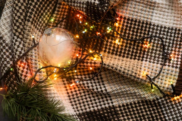 Christmas lights bulb frame decoration. Merry Christmas and New Year holiday background.