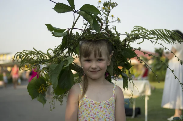 Little girl with wreath — Stock Photo, Image