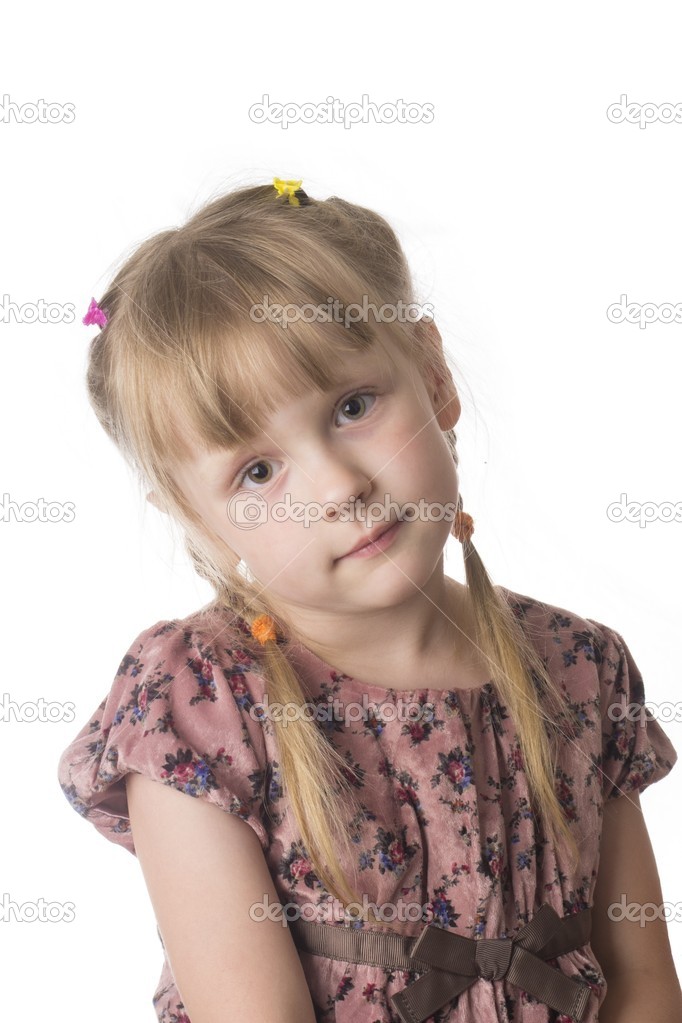 Little serious girl on white background