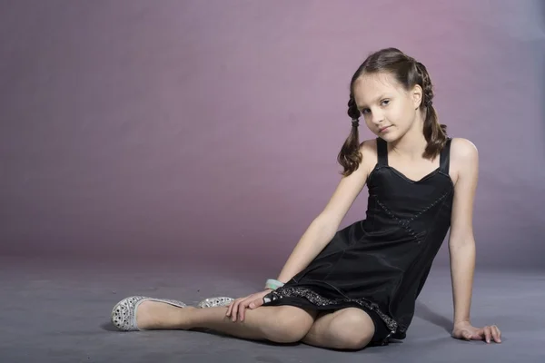Nice girl in black dress in studio — Stock Image Nice girl in black dress in studio Stock Image