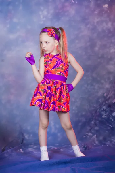 Little girl dancing in colourfull costume — Stock Photo, Image