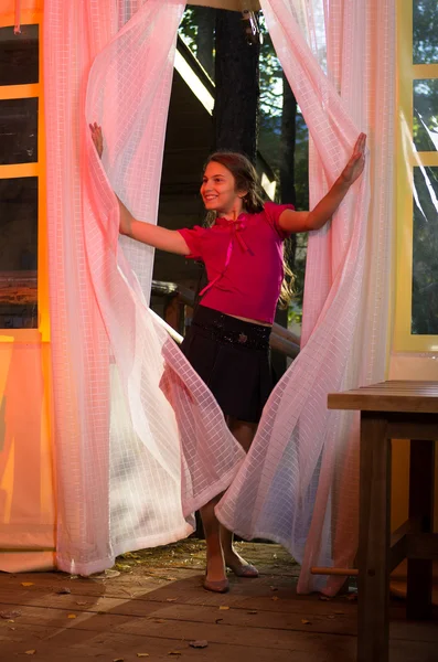 Young girl entering dancing summer pavilion — Stock Photo, Image