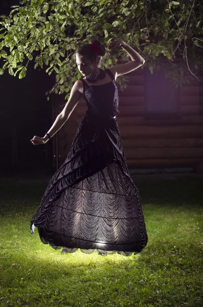 Young beatifull girl in black dress — Stock Photo, Image