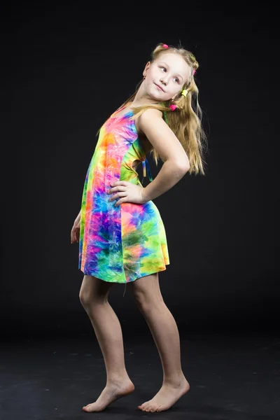 Child girl posing in colourful dress — Stock Photo, Image