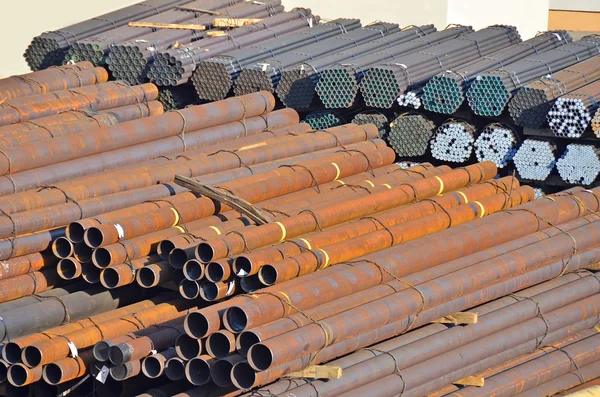 Stacked PVC and steel pipe — Stock Photo, Image