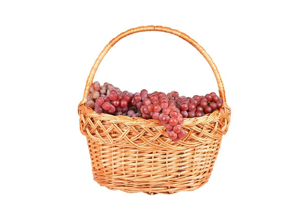 Red grape in a wattled basket — Stock Photo, Image