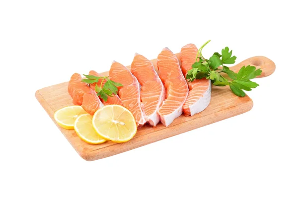 Salmon steak with parsley and lemon — Stock Photo, Image