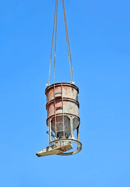 Crane lifting cement mixing container — Stock Photo, Image