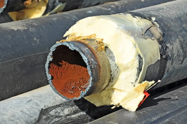 Rusty steel pipe with heat insulation — Stock Photo, Image