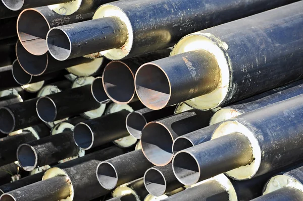 Rusty steel pipe with heat insulation — Stock Photo, Image