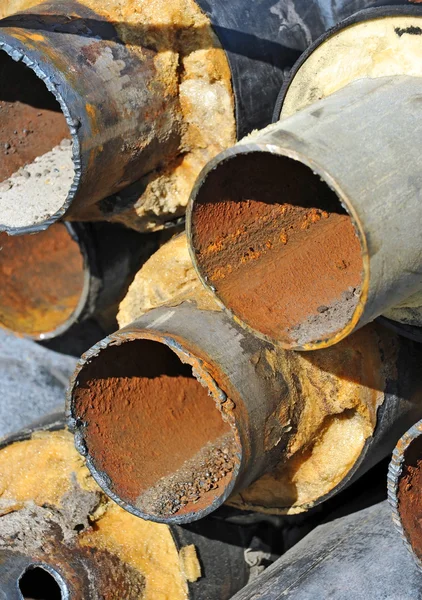 Rusty steel pipe with heat insulation — Stock Photo, Image