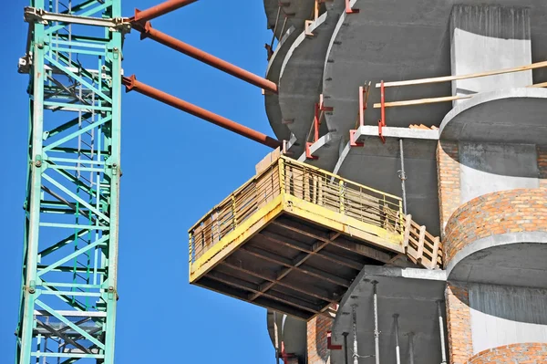 Guindaste e canteiro de obras — Fotografia de Stock