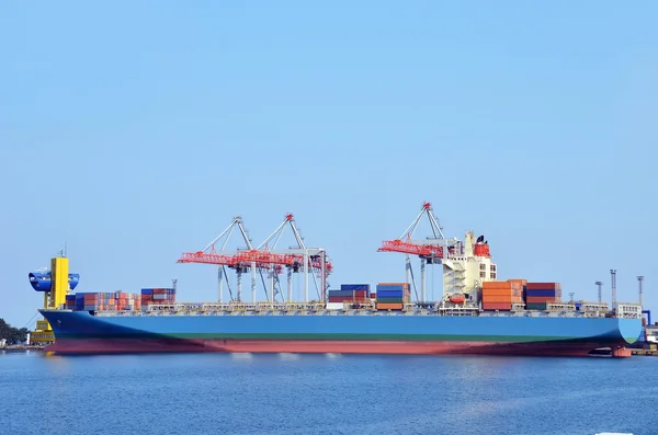 Cargo crane and ship — Stock Photo, Image