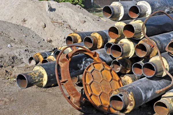 Rusty steel pipe with heat insulation — Stock Photo, Image