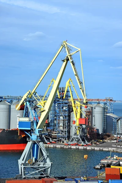 Cargo crane, ship and grain dryer — Stock Photo, Image