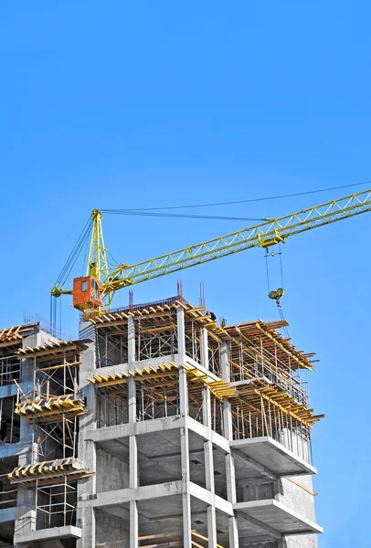 Crane and construction site Stock Photo