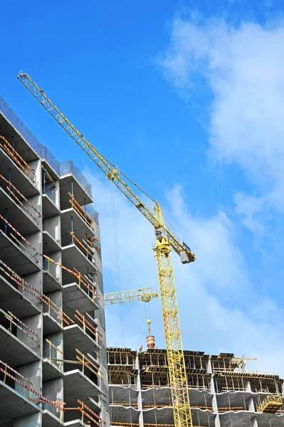 Crane and construction site Stock Image