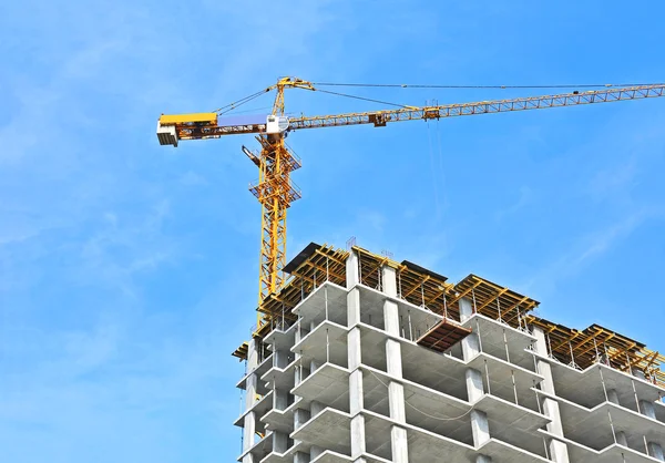 Crane and construction site Stock Photo