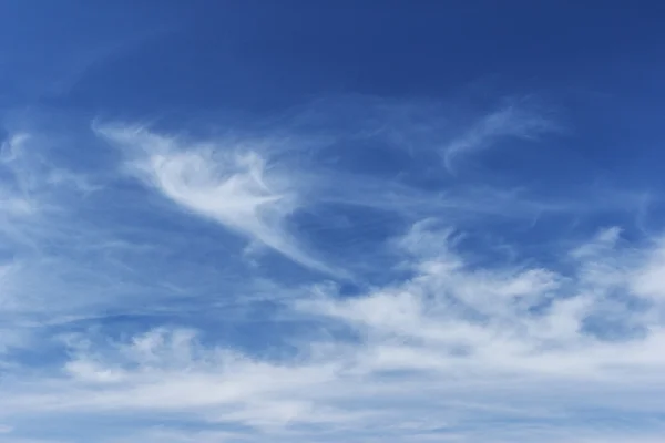 Blue sky background with white clouds Stock Picture